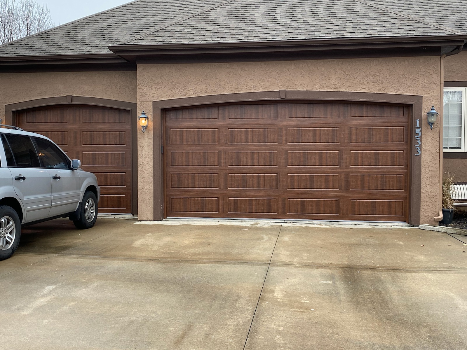 Garage door roller and track repair service